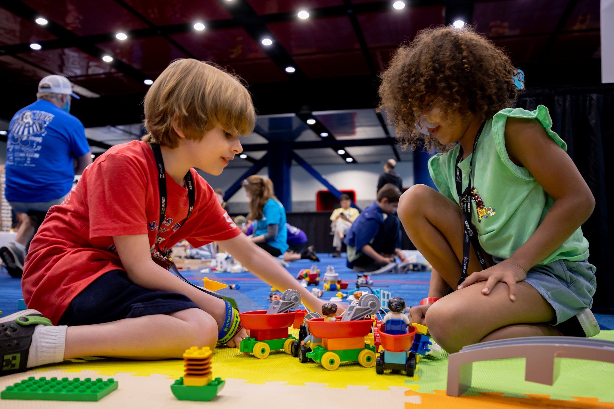 Children play with LEGO DUPLO bricks at FIRST Championship