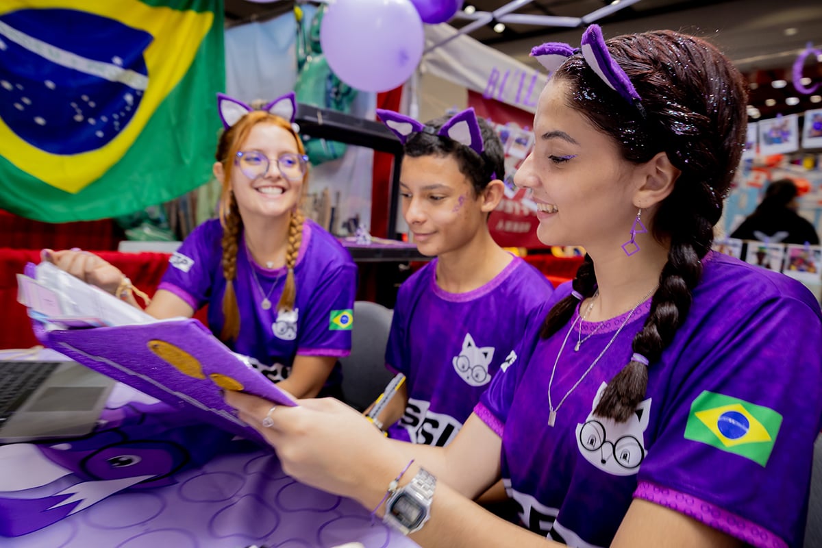 Three FIRST LEGO League students participating at FIRST Championship