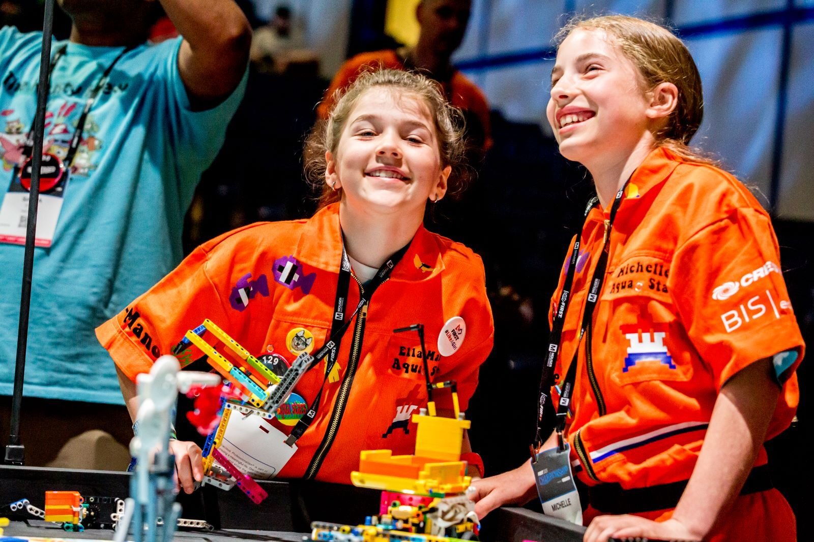 Two girls at a robotics table